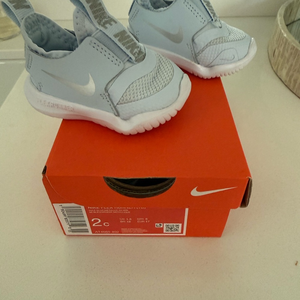 Nike Baby/Toddler Slip-On Athletic Shoes in Light Blue and White -size 2C